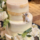 A “dog eating the cake” figurine is a fun alternative to the classic bride/groom cake toppers.